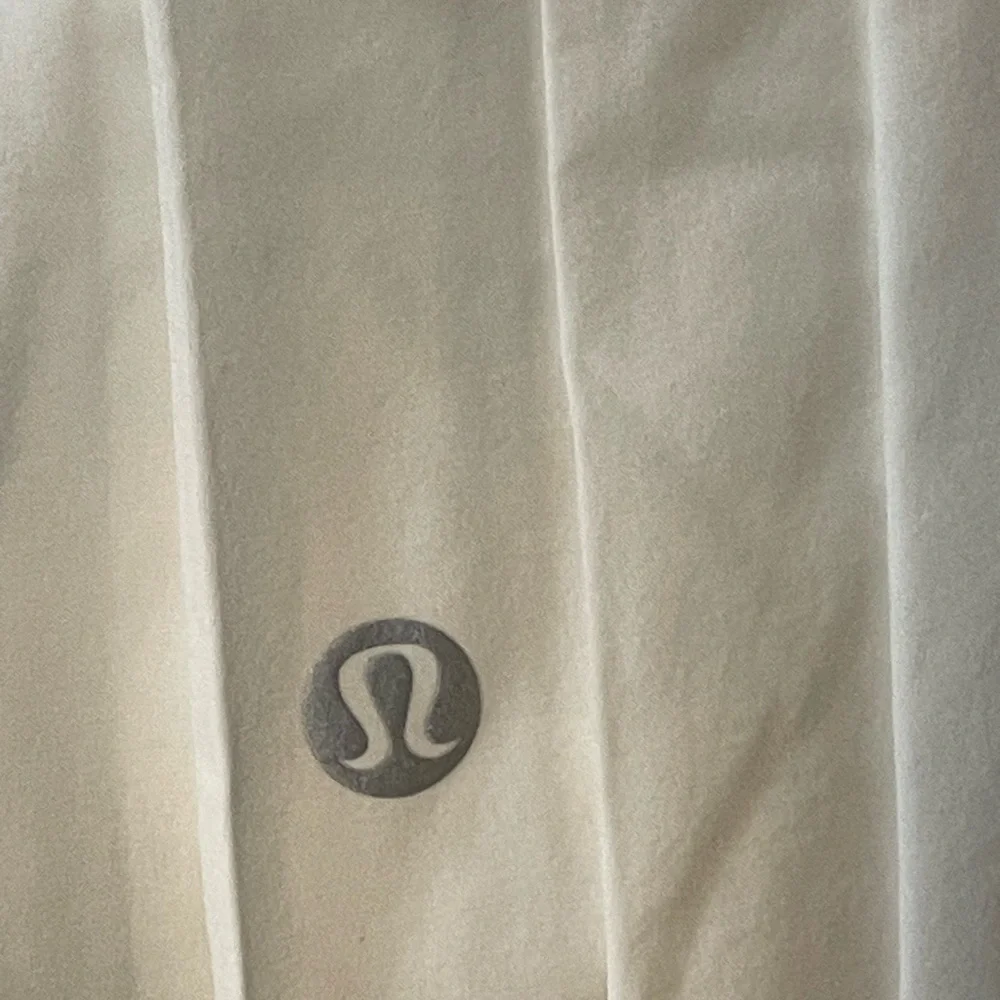#090, Lululemon side-pleat high-rise tennis skirt, size 8